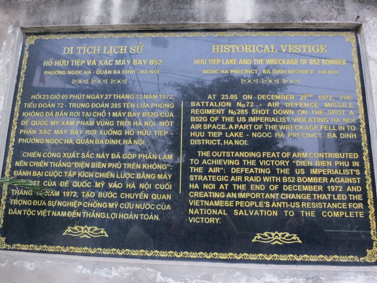 Inscription located on building next to Huu Tiep Lake, where the remains of a downed B52 still resides. Note the reference to "Dien Bien Phu in the Air" and the defeat of the "US Imperialists".