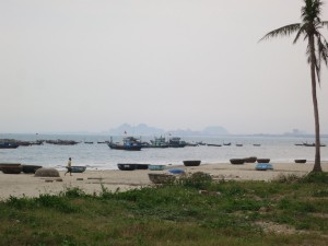 Fishing boats in Da Nang. In the background are the Marble Mountains.